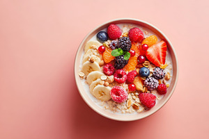 Colorful oatmeal bowl with fruits and nuts, a Food & Drink Photo by AlyaAnd