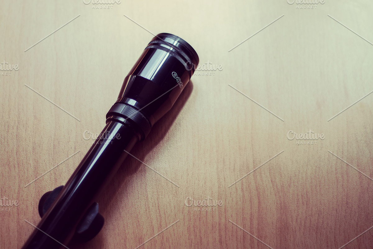 Optical Target Scope on Wood Table, a Technology Photo by PixelPerfect (Photo 5 of 5)