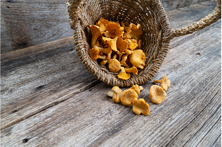 chanterelle mushrooms on wooden, a Food & Drink Photo by Neirfy