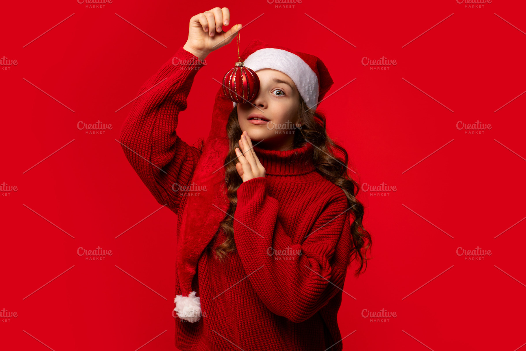 Girl in Santa hat, a Holiday Photo by Elena Vagengeim