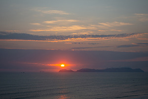 Sunset over the bay and Isla San Lorenzo in Lima, Peru, a Nature Photo by GoodGoods