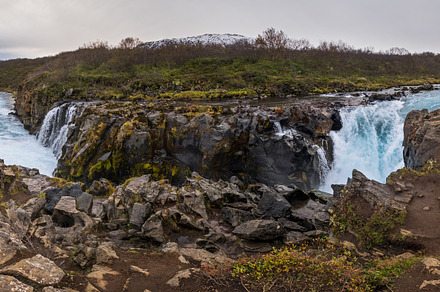 Picturesque waterfall Hlauptungufoss autumn view. Season changin, a Nature Photo by YuriyB