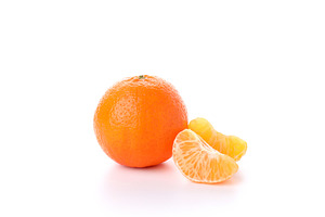 Mandarin and slices isolated on white background, a Food & Drink Photo by AtlasStudio PRO