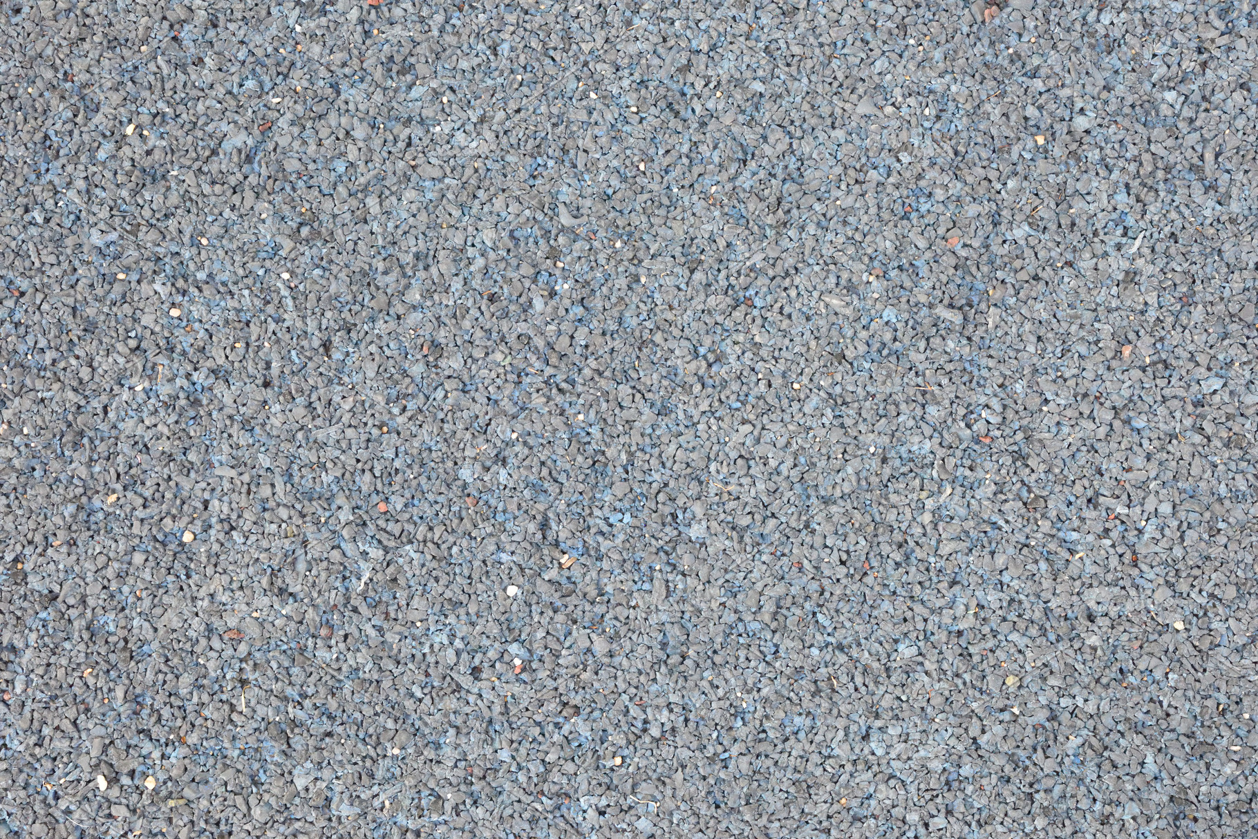 Detail of compact rubber tile of small pieces for cushioning, a Background Photo by Davizro's Market