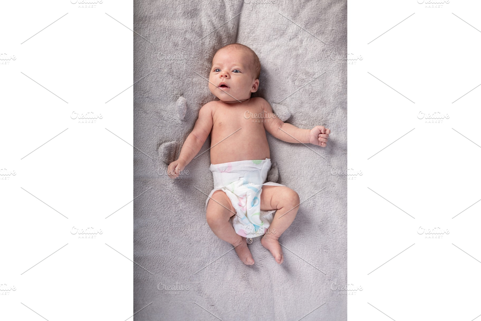 Pretty smiling baby girl and toy stock photo containing baby and childhood, a Person Photo by coob.kz