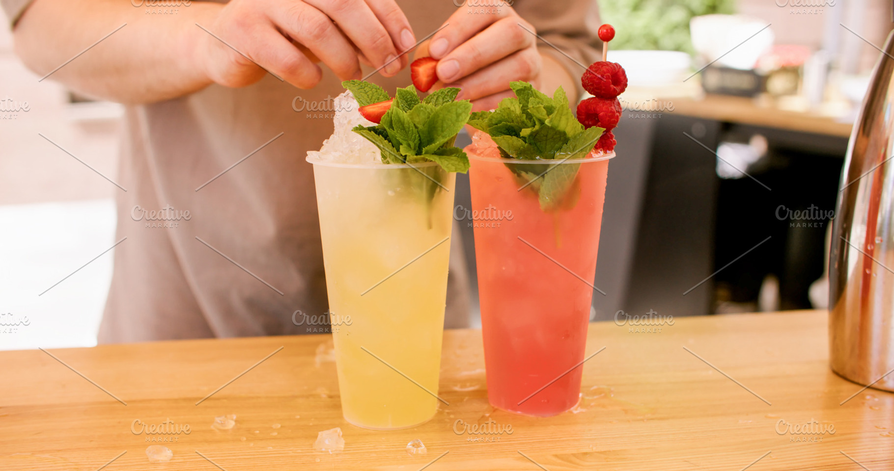 Garnishing cocktails refreshing beverages hand ice, a Food & Drink Photo by Photo Drive Studio