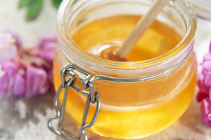 Honey and honey dipper with acacia flowers, a Food & Drink Photo by Olena Rudo