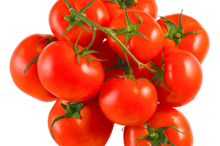 Red tomatoes fresh harvest on a white background, isolate, a Food & Drink Photo by oleghz