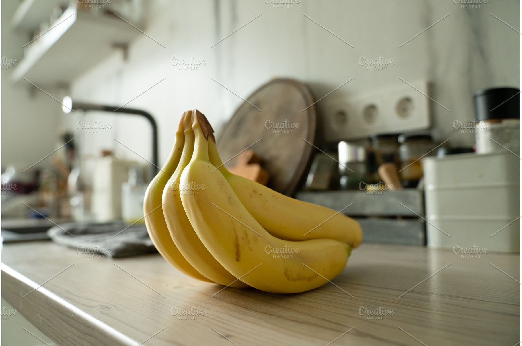 Bunch of bananas lying on the wooden, a Food & Drink Photo by oksix