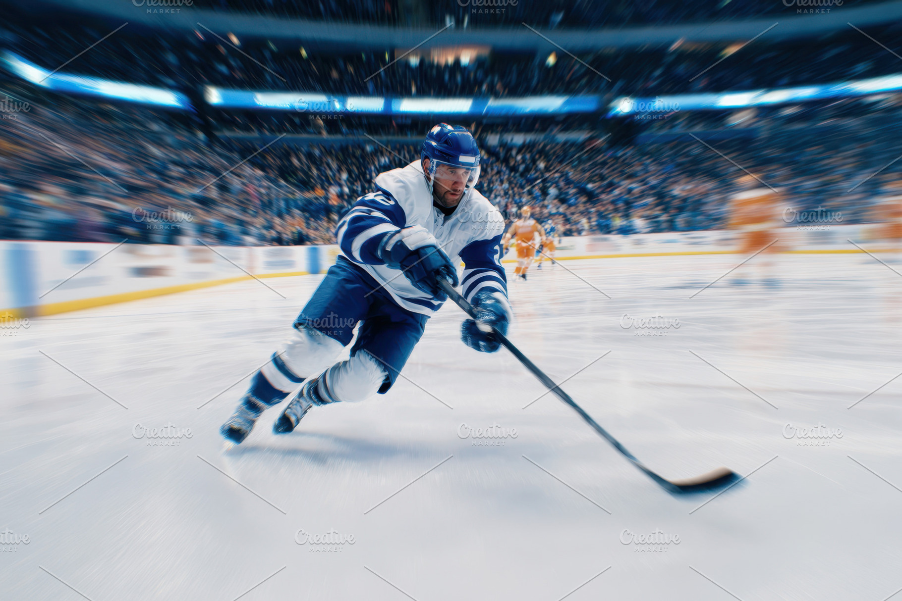 Dynamic hockey player in action on ice, a Sports & Recreation Photo by AlyaAnd