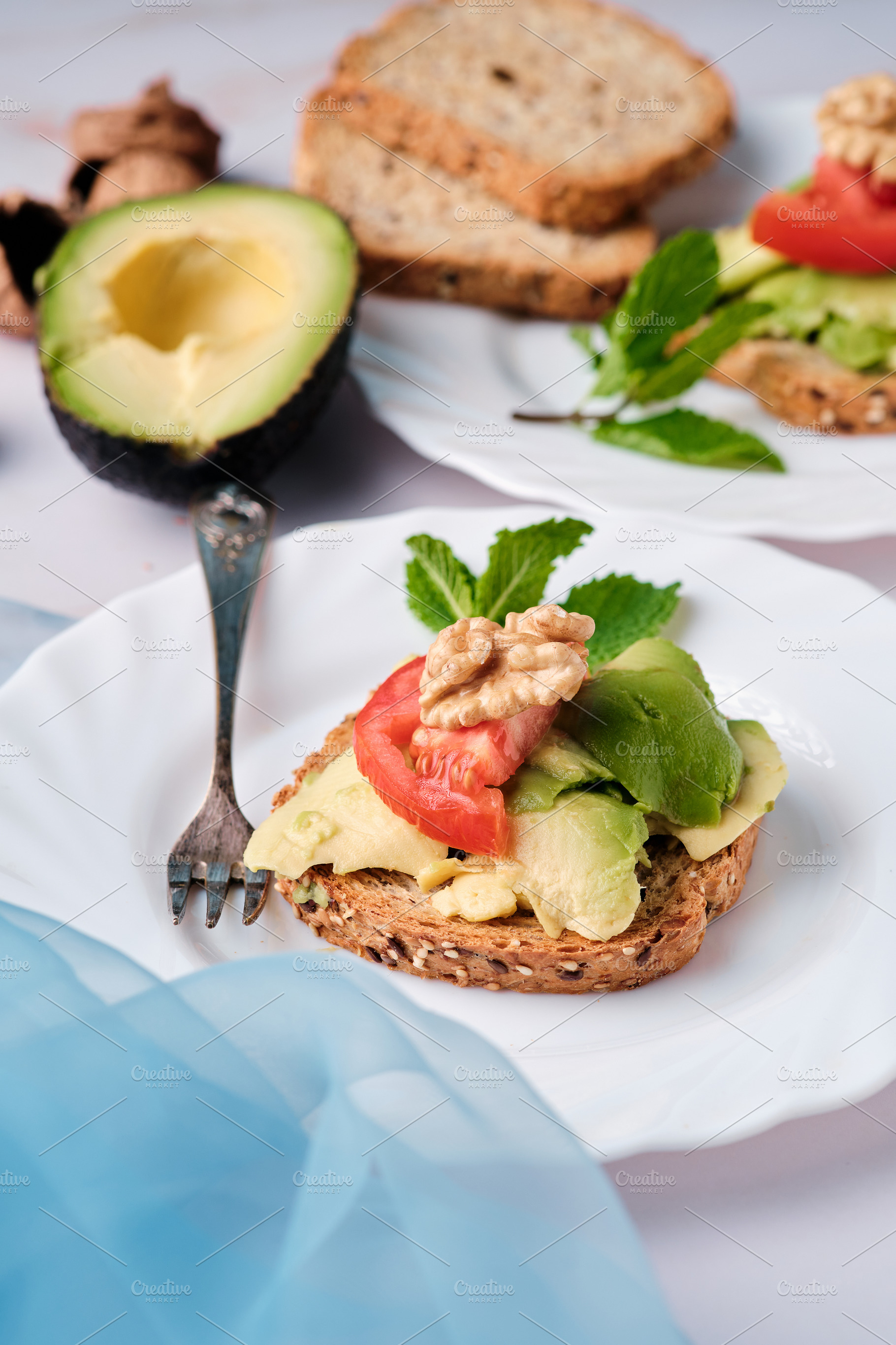 Toasted bread with avocado paste and, a Food & Drink Photo by alfernec
