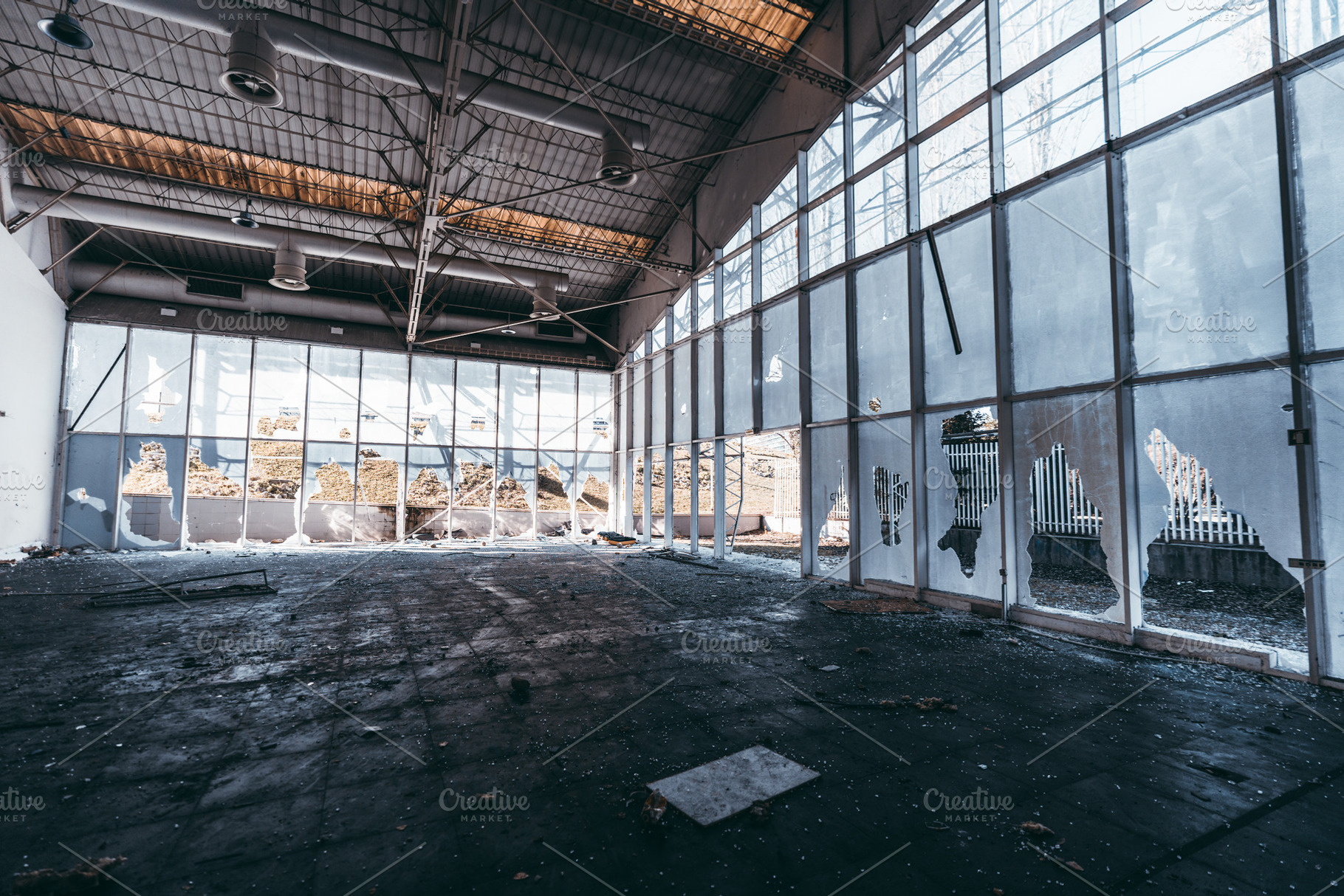 Abandoned vandalized industrial site, an Industrial Photo by SkyNext