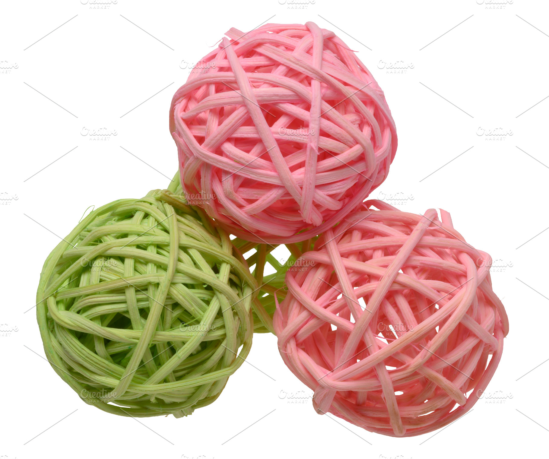 Pink and green rattan wicker ball on isolated background as a de, an Abstract Photo by ndanko