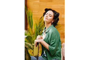 Portrait of woman with hair rollers, a Person Photo by HalfPoint