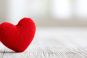 Soft red heart symbolizing love and, a Holiday Photo by MistyDay