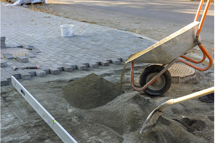 Road works on a street in the city, an Industrial Photo by Ungvar Studio