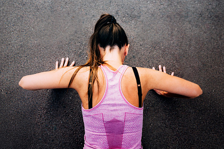 Athletic woman doing pushups outdoor. Top view. Hard sport train, a Sports & Recreation Photo by hitdelight