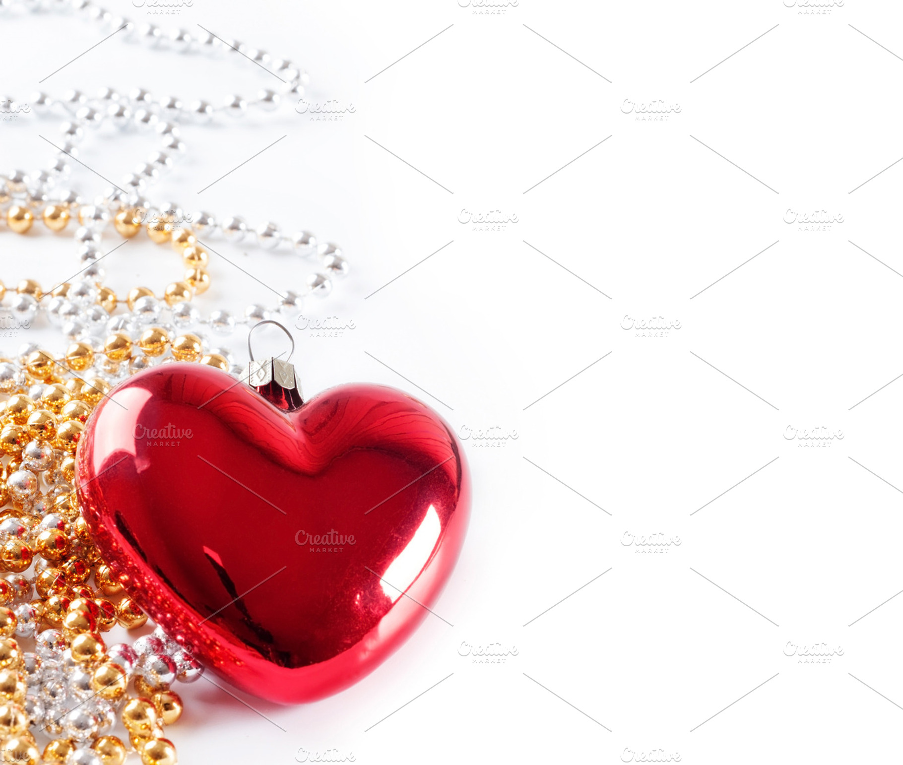 Red heart and beads, a Holiday Photo by Artspace
