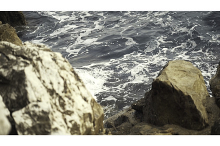 Close-up of grey waves with foam, a Nature Photo by Media Whale Stock