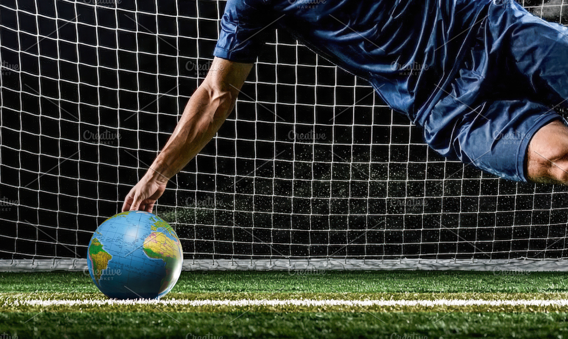 Goalkeeper Grabs Earth Ball on Soccer Goal Line, a Sports & Recreation Photo by Davizro's Market