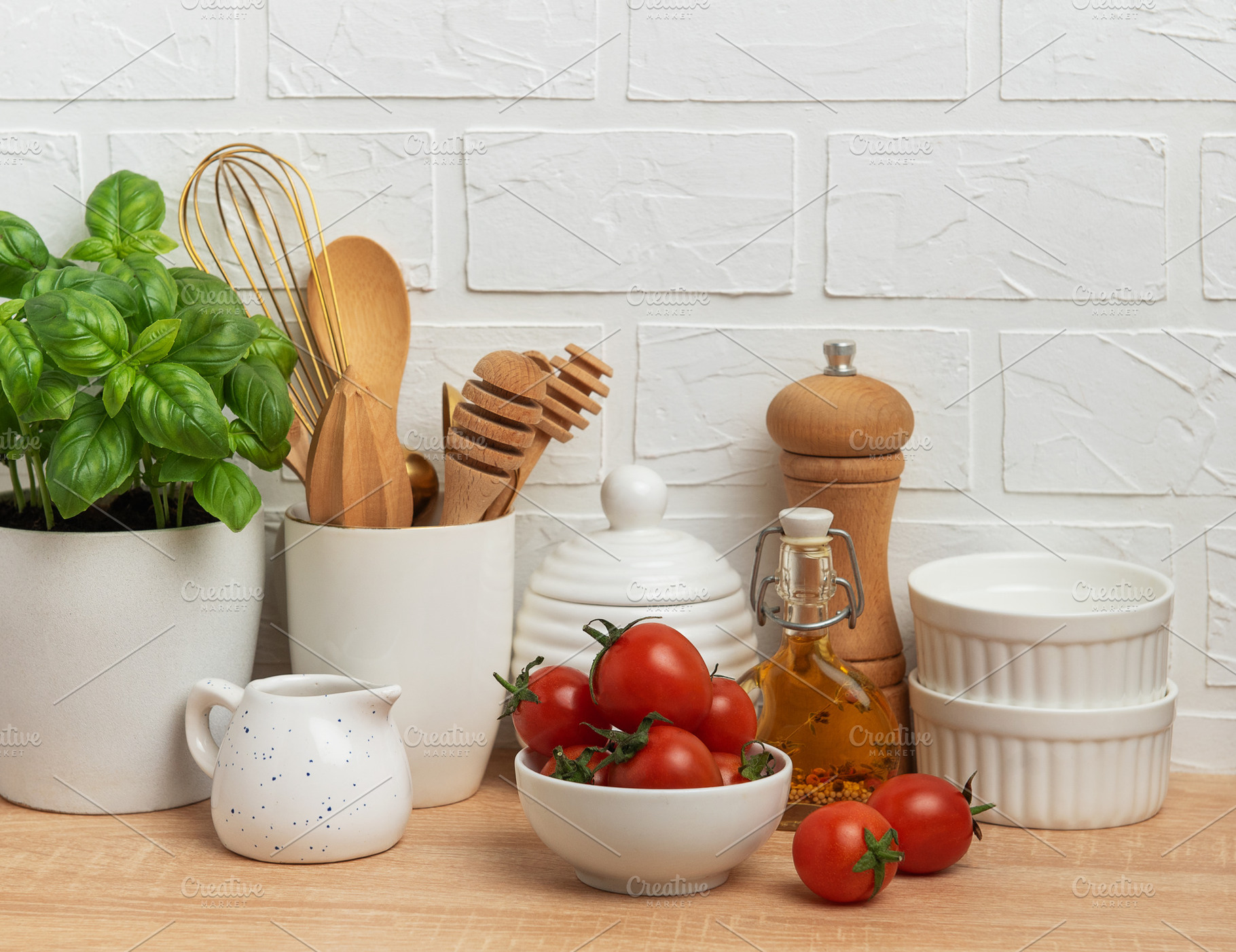 Kitchen utensils, fresh tomatoes and basil creating a modern cul, a Food & Drink Photo by Olena Rudo