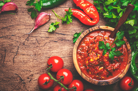 Traditional armenian spicy adjika sauce with hot pepper, paprika, a Food & Drink Photo by 5PH