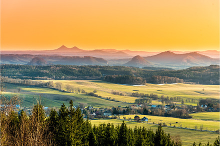 Hilly landscape illuminated by stock photo containing landscape and grass, a Nature Photo by pytyczech