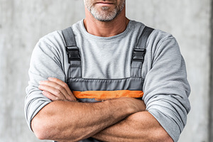 Confident mature handyman in work, an Industrial Photo by MistyDay