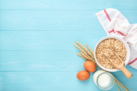 Rolled oats, bottle of milk and eggs, a Food & Drink Photo by The baking man