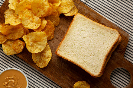 Homemade American Peanut Butter Sandwich on a Wooden Board, top