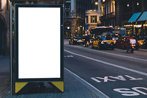 Bus stop in city featuring lightbox, billboard, and banner, an Industrial Photo by A_B_C