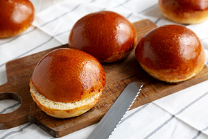 Homemade Brioche Buns Ready to Eat, side view., a Food & Drink Photo by LiudmylaChuhunova