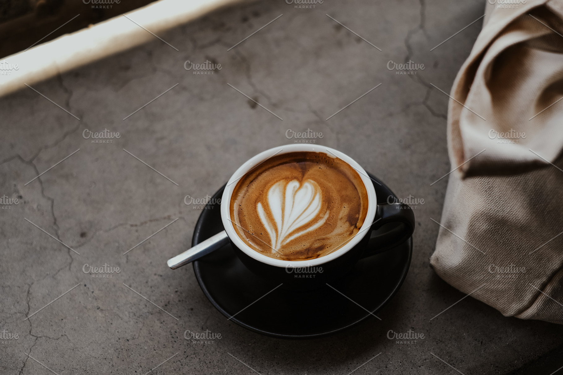 A cup of coffee on concrete, a Food & Drink Photo by Valeriia Miller