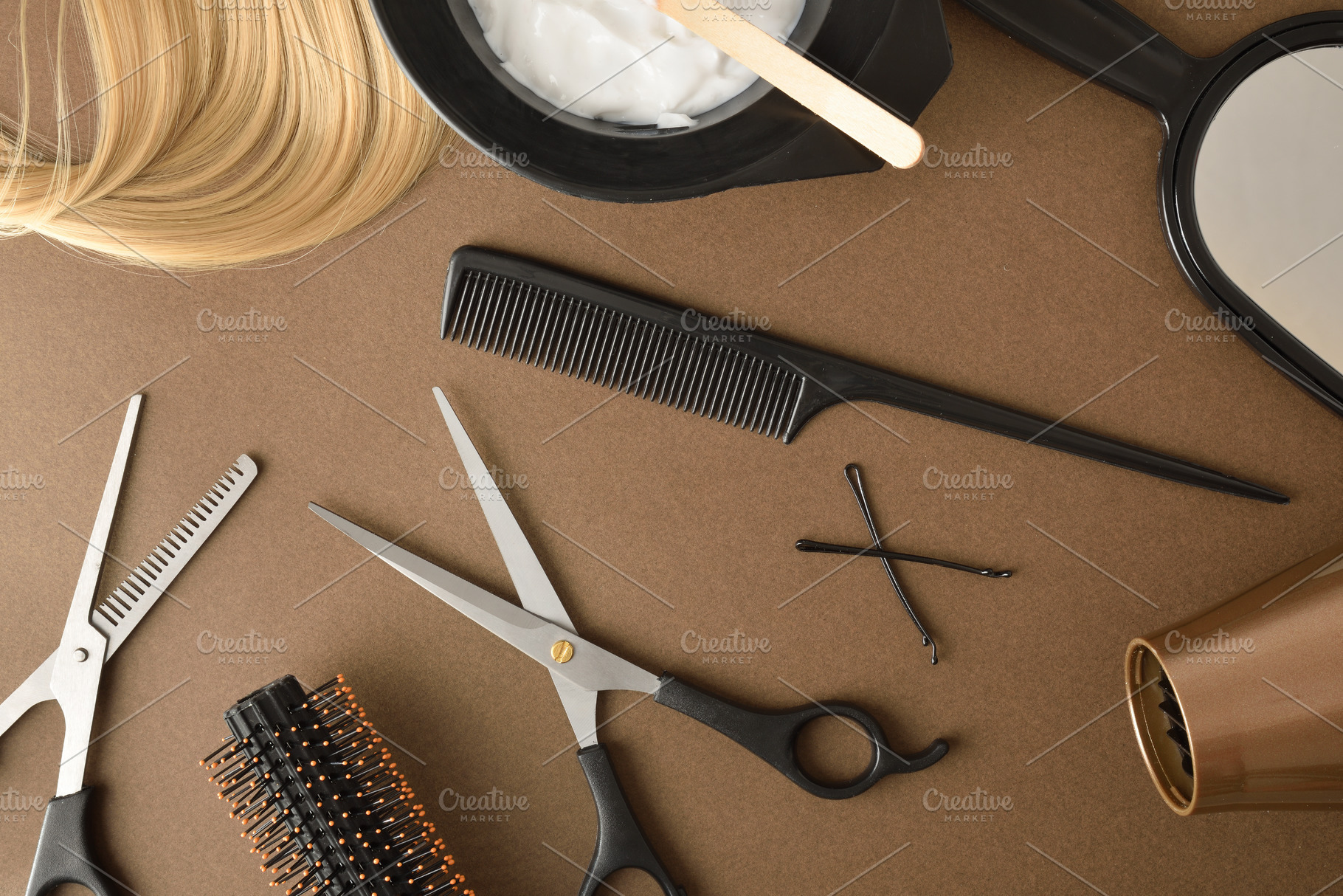 Hairdressing tools for haircut and color on brown table, a Beauty & Fashion Photo by Davizro's Market
