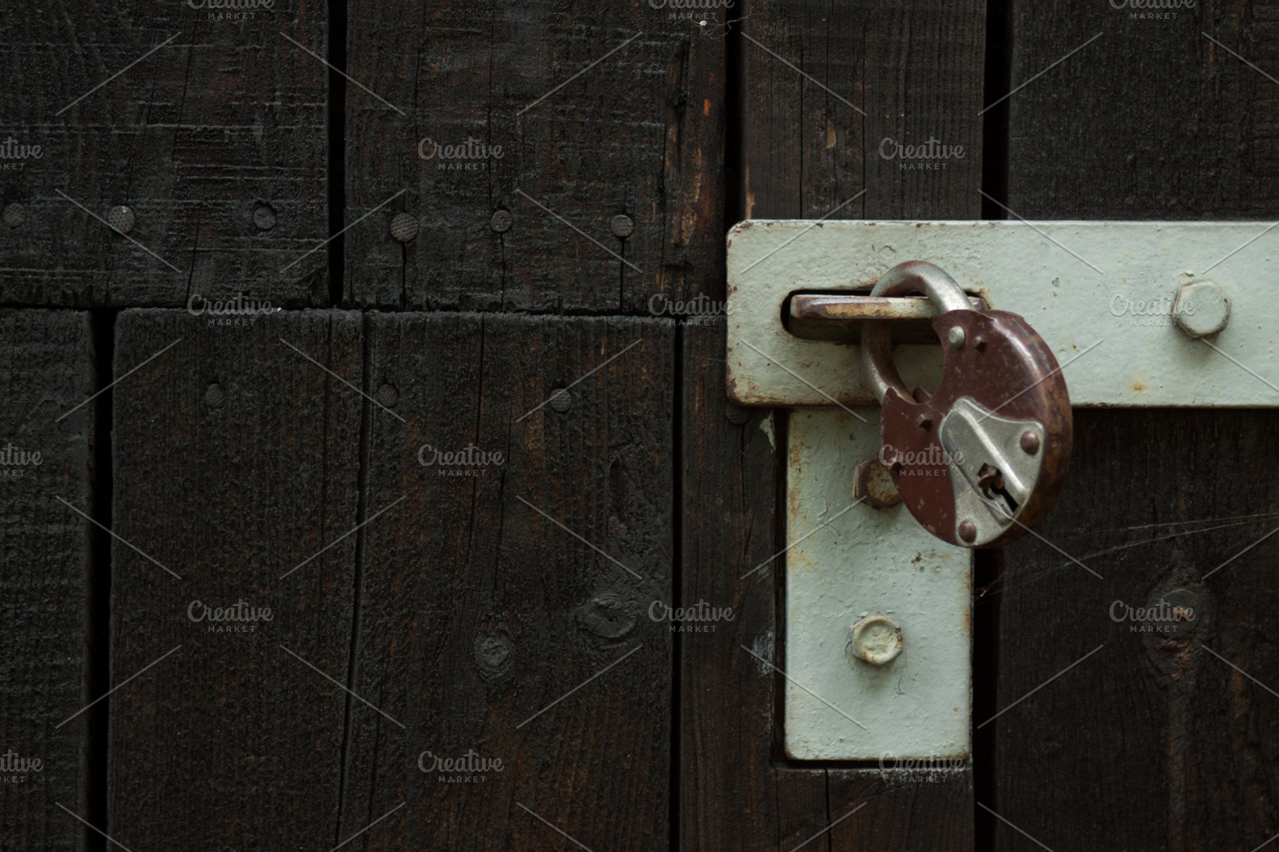 Padlock and wood