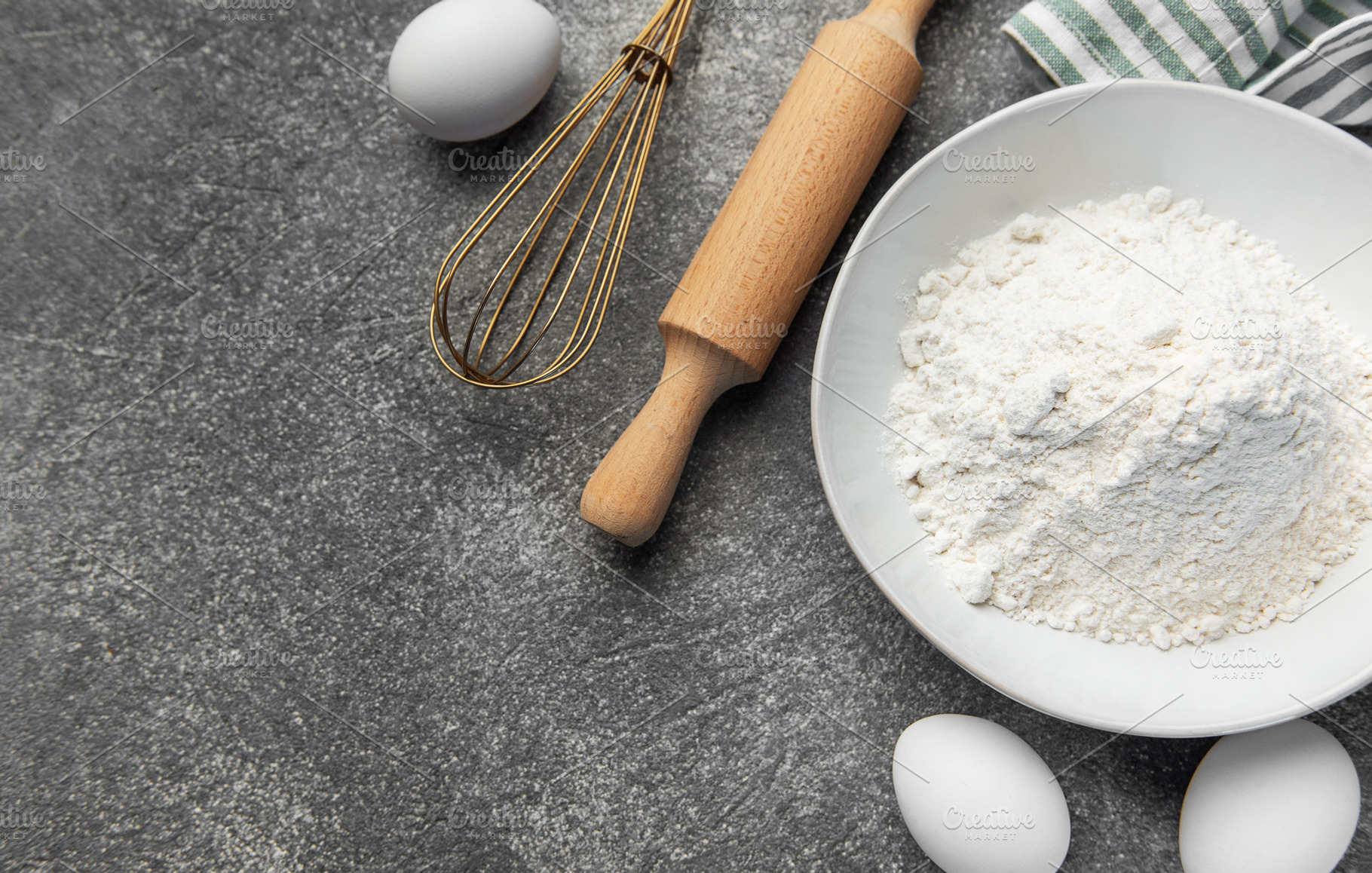 Baking ingredients on kitchen counter preparing pastry, a Food & Drink Photo by Olena Rudo