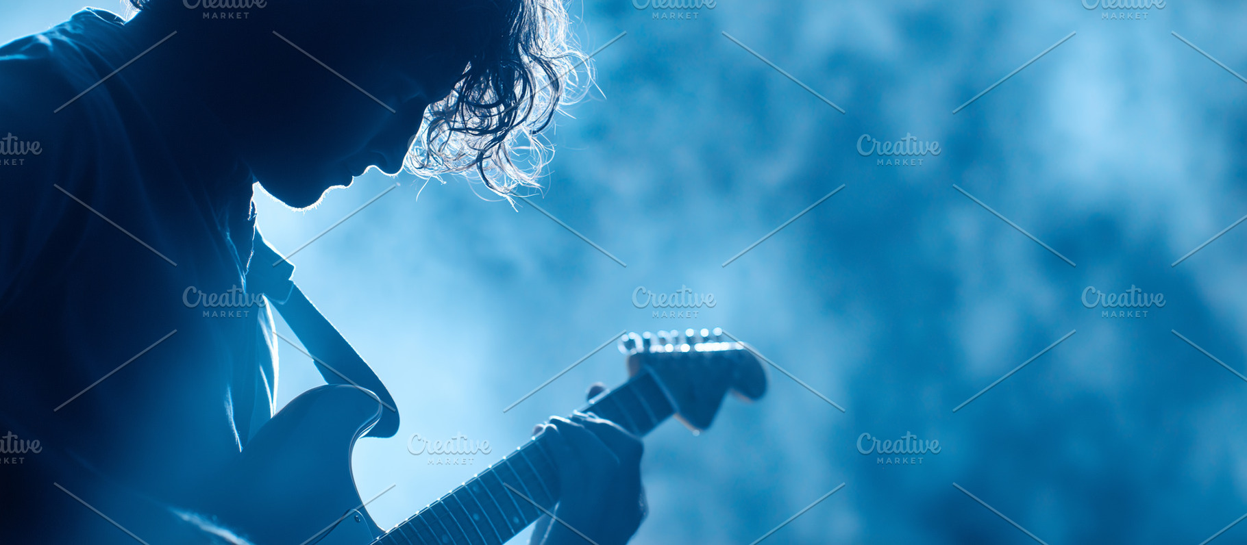 Silhouette of a guitarist playing, an Arts & Entertainment Photo by MistyDay