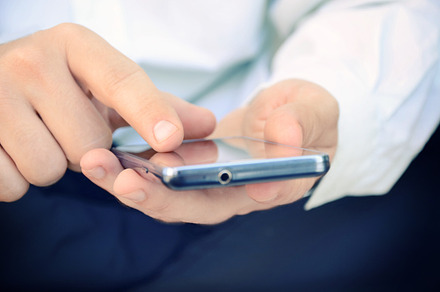 Man using smartphone containing business, phone, and concept, a Technology Photo by PureSolution