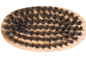 Wooden brush with dense natural black bristles, oval shape. Isol, a Beauty & Fashion Photo by ndanko