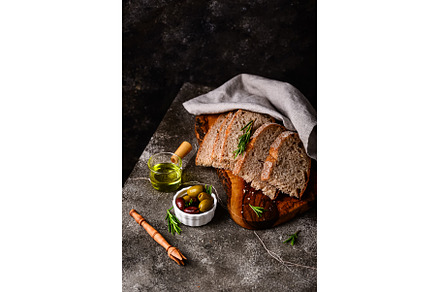 Fresh bread, olive oil and mix of