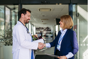 Confident female medical sales, a Business Photo by HalfPoint