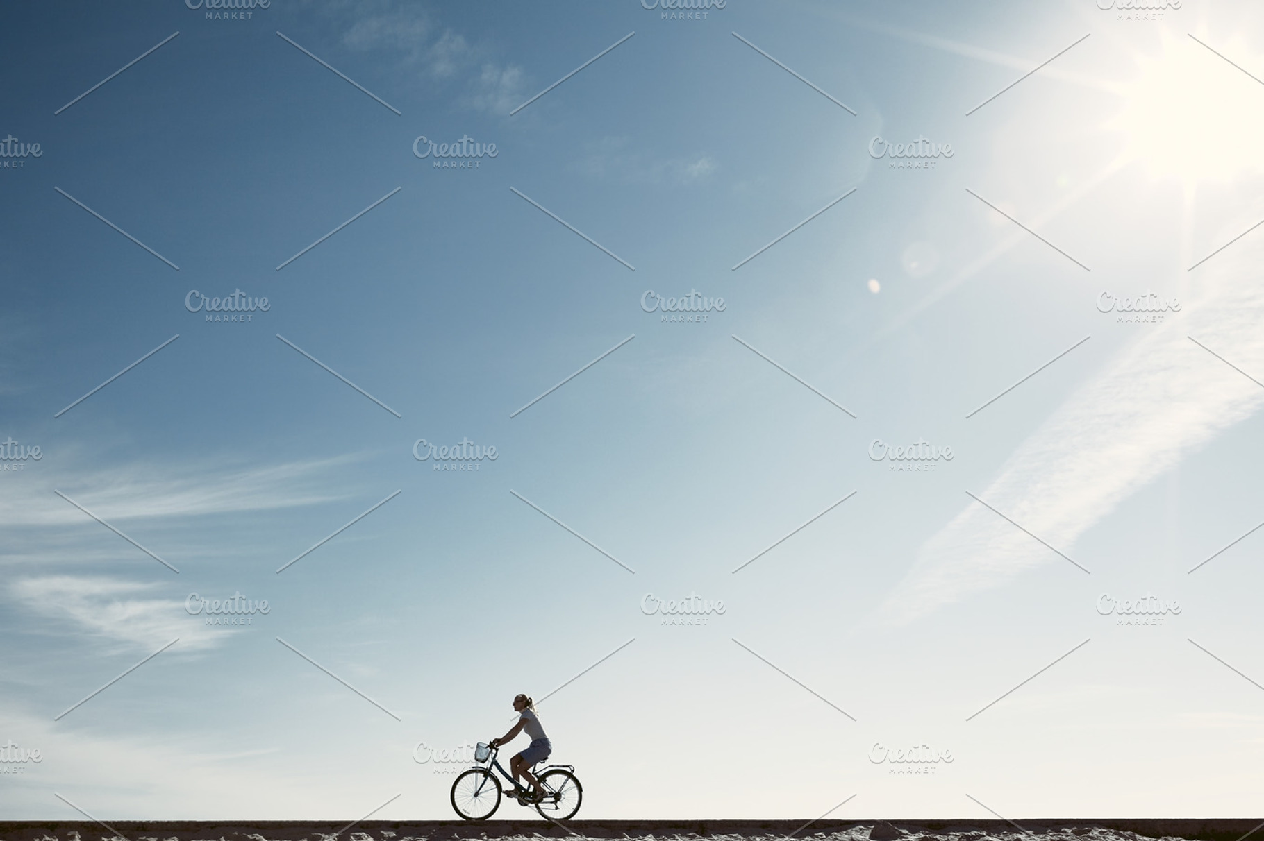 Girl enjoying bike ride silhouette, a Person Photo by Sergey Furtaev