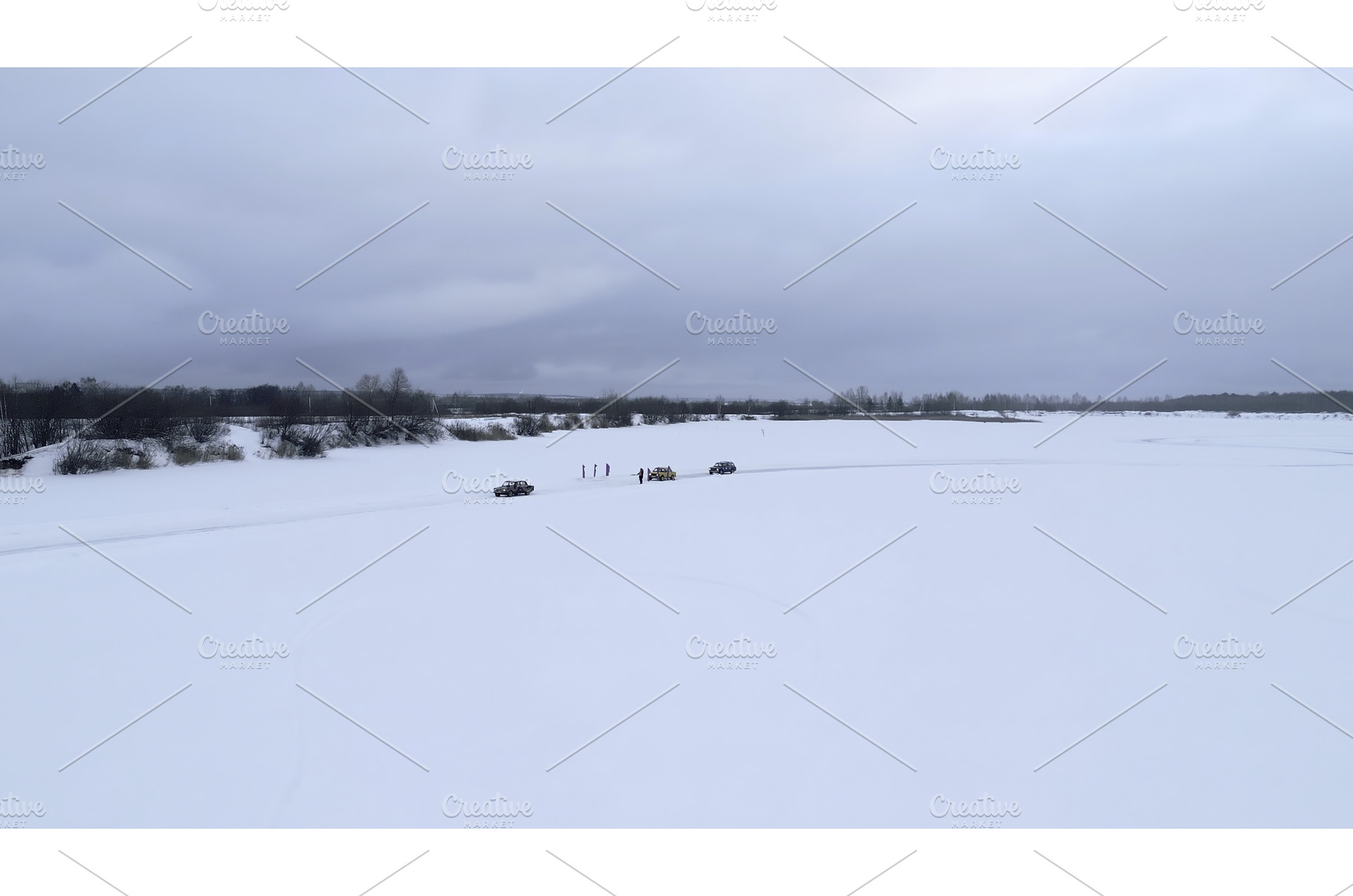 Bending winter ice track and driving, a Nature Photo by Media Whale Stock