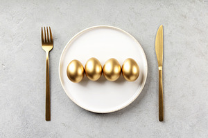 Golden Eggs on White Plate with Luxury Table Setting, a Holiday Photo by Natalia Klenova's Shop