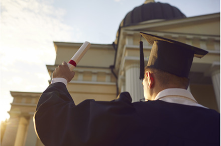 Student in gown and academic hat, a School & Education Photo by StudioRomantic