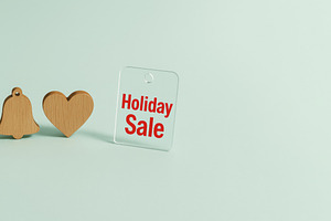 Holiday sale with wooden icons of tr, a Photo by Dvoevnore photos