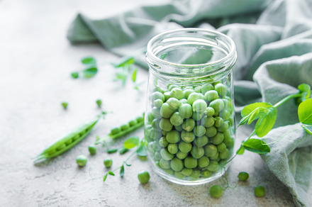 Jar with sweet pea pods, a Food & Drink Photo by Olena Rudo