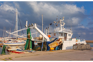 Fishing boat in Chania harbor, Crete, a Transportation Photo by kavalenkava