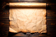Blank scroll with wrinkled parchment over dark wooden planks, a Background Photo by GoodGoods (Thumbnail 2 of 2)