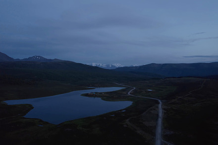 Aerial view on lakes and mountains with dramatic sky in Altai, a Nature Photo by TravelFlow